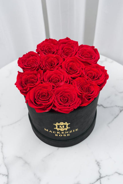 12 Preserved Roses in Medium Black Round Velvet Box