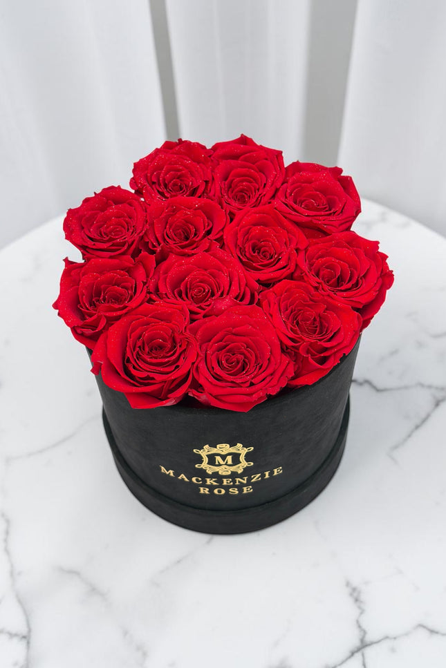 12 Preserved Roses in Medium Black Round Velvet Box