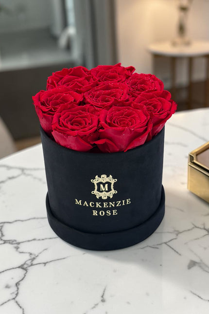 8  Preserved Roses in Small Black Round Velvet Box