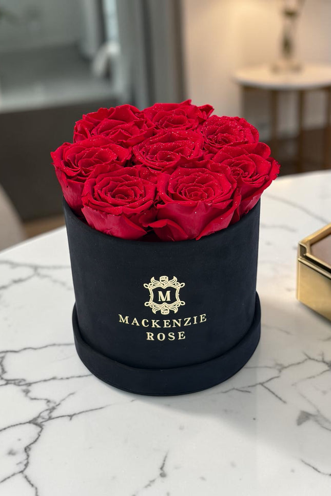 8  Preserved Roses in Small Black Round Velvet Box