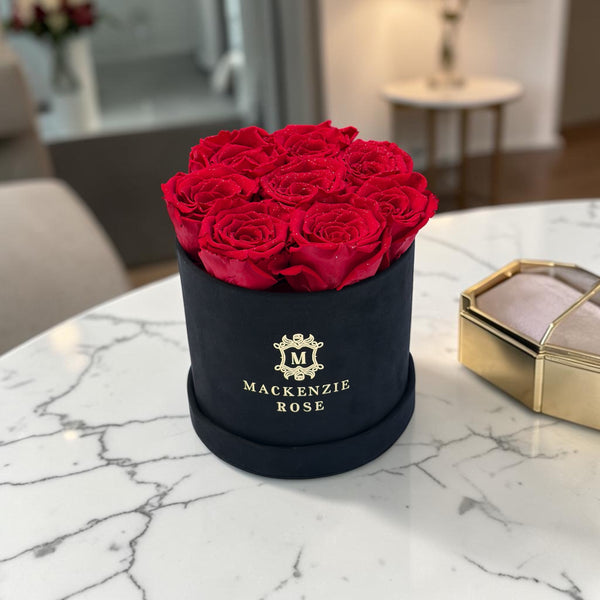8  Preserved Roses in Small Black Round Velvet Box