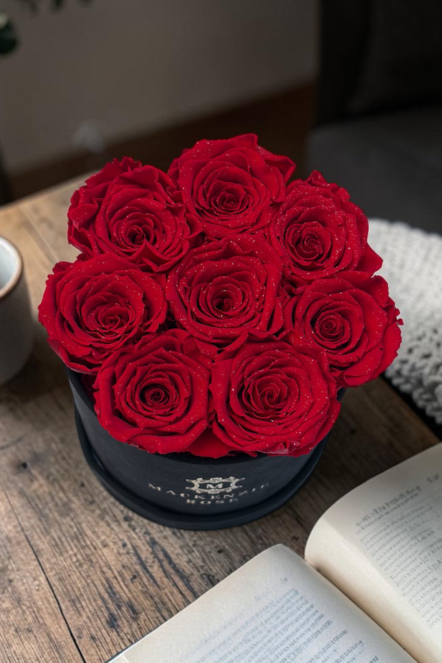 8  Preserved Roses in Small Black Round Velvet Box